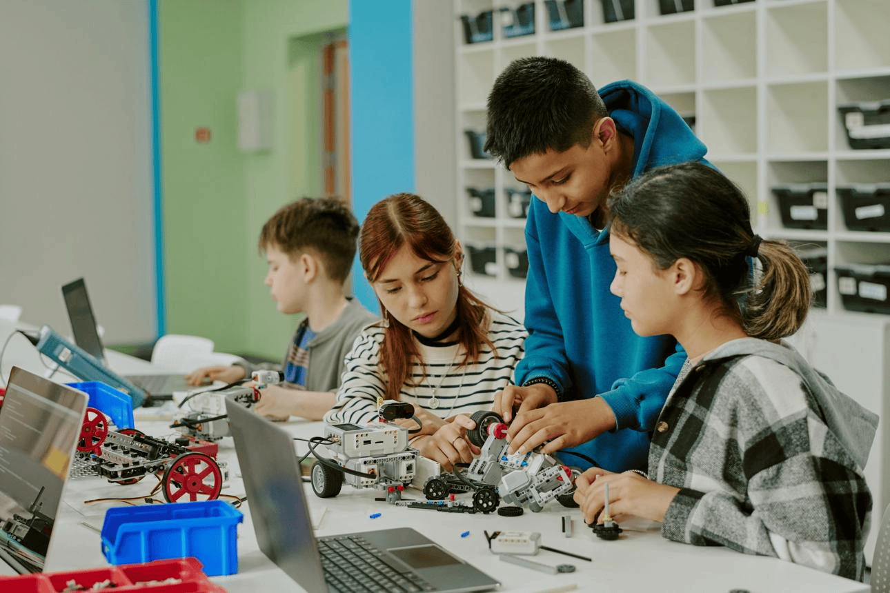Children developing STEM skills through robotics activities